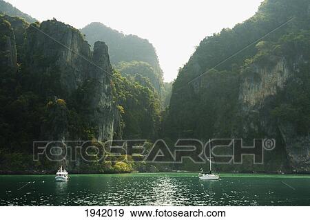 Boats On Maya Bay; Phi Phi Island Thailand View Large Photo Image Stock Photo - Boats On Maya Bay; Phi Phi Island Thailand. Fotosearch