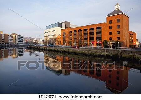Stock Image - Buildings Along The River Lee; Cork City County Cork Ireland. Fotosearch