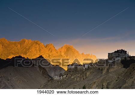Buildings On The Edge Of Rock Ledges Beside The Mountains; Lamayuru Ladakh India View Large Photo Image Stock Image - Buildings On The Edge Of Rock Ledges Beside The Mountains; Lamayuru Ladakh India. Fotosearch