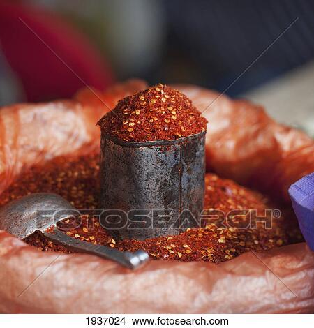 Chili Powder In A Container With A Scoop At A Market; Thimphu Thimphu District Bhutan View Large Photo Image Picture - Chili Powder In A Container With A Scoop At A Market; Thimphu Thimphu District Bhutan. Fotosearch