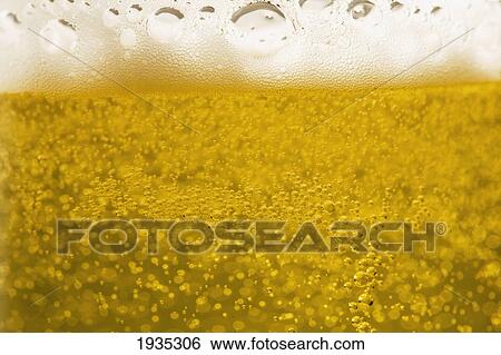 Close-Up Of Beer Bubbles And Foam In A Glass View Large Photo Image Stock Photograph - Close-Up Of Beer Bubbles And Foam In A Glass. Fotosearch