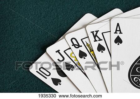 Stock Image - Close-Up Of Blackjack Playing Cards Showing Spades Royal Flush. Fotosearch