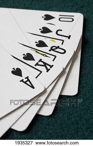 Stock Photo - Close-Up Of Blackjack Playing Cards Showing Spades Royal Flush. Fotosearch