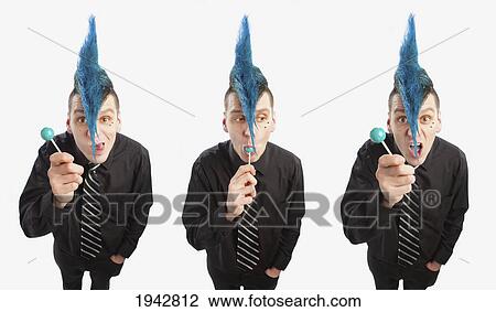 Composite Of Three Men With A Blue Mohawk Eating A Blue Candy And Making Expressive Faces View Large Photo Image Stock Image - Composite Of Three Men With A Blue Mohawk Eating A Blue Candy And Making Expressive Faces. Fotosearch
