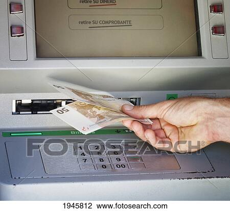 customer withdrawing money from a bank cash point machine; torremolinos malaga andalusia spain View Large Photo Image Stock Image - customer withdrawing money from a bank cash point machine; torremolinos malaga andalusia spain. Fotosearch