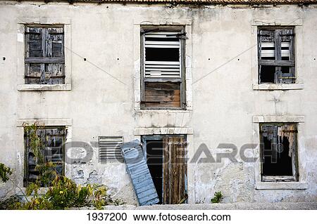 Stock Image - Dilapidated And Abandoned House; South Caicos Turks And Caicos Islands. Fotosearch