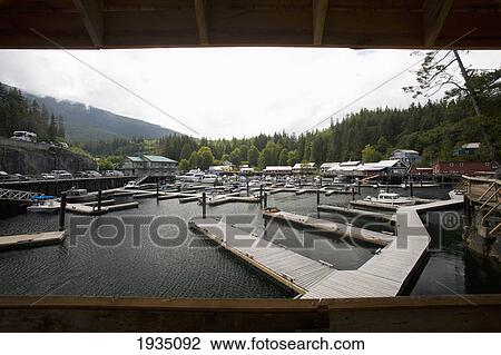 Stock Image - Docks And Marina; Telegraph Cove, Vancouver Island, British Columbia, Canada. Fotosearch