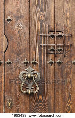 Stock Photo - door with knocker and judas window; grazalema cadiz andalusia spain. Fotosearch