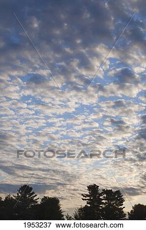 Stock Photo - early morning clouds; waterloo quebec canada. Fotosearch