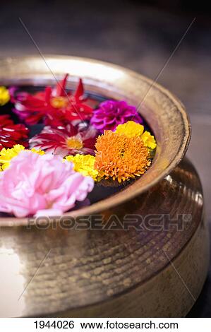 Stock Photograph - Flowers Floating In A Bowl Filled With Water; Bhaktapur Nepal. Fotosearch