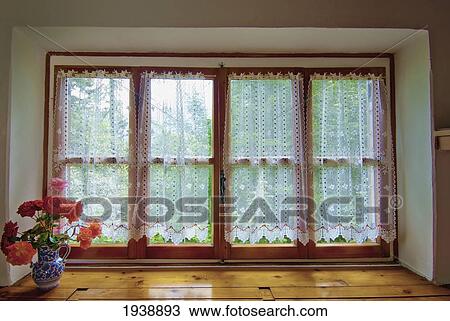 Stock Image - Flowers On Windowsill; Veneto Italy. Fotosearch