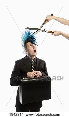 Garden Trimmers Coming To Cut A Blue Mohawk Off Of A Businessman's Head View Large Photo Image Picture - Garden Trimmers Coming To Cut A Blue Mohawk Off Of A Businessman's Head. Fotosearch