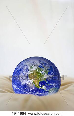 Globe Sitting On A Cushion View Large Photo Image Picture - Globe Sitting On A Cushion. Fotosearch