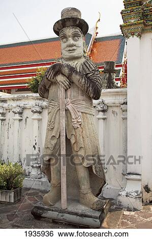 Guardian Statue At Wat Pho, Temple Of The Reclining Buddha; Bangkok, Thailand View Large Photo Image Stock Photograph - Guardian Statue At Wat Pho, Temple Of The Reclining Buddha; Bangkok, Thailand. Fotosearch