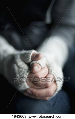 Hands Clasped Wearing Fingerless Gloves; Victoria British Columbia Canada View Large Photo Image Stock Image - Hands Clasped Wearing Fingerless Gloves; Victoria British Columbia Canada. Fotosearch
