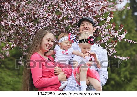 Happy Family In Park In Spring; Portland Oregon View Large Photo Image Stock Photo - Happy Family In Park In Spring; Portland Oregon. Fotosearch