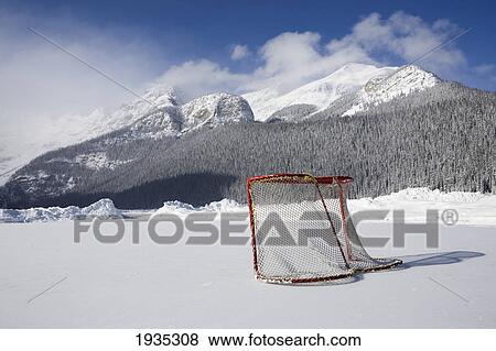 Hockey Net On Outdoor Ice Rink; Lake Louise, Alberta, Canada View Large Photo Image Stock Photo - Hockey Net On Outdoor Ice Rink; Lake Louise, Alberta, Canada. Fotosearch