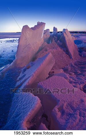 ice pushed up on the shoreline of the lake; pigeon lake alberta canada View Large Photo Image Stock Photo - ice pushed up on the shoreline of the lake; pigeon lake alberta canada. Fotosearch