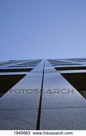 low angle view of an office tower and a blue sky; montreal quebec canada View Large Photo Image Stock Image - low angle view of an office tower and a blue sky; montreal quebec canada. Fotosearch