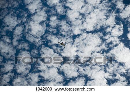 Stock Photo - Low Angle View Of Helicopter In The Sky; Victoria Park Perth Western Australia. Fotosearch