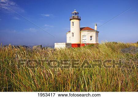 Stock Photo - morning light adds beauty to coquille river lighthouse; bandon oregon united states of america. Fotosearch