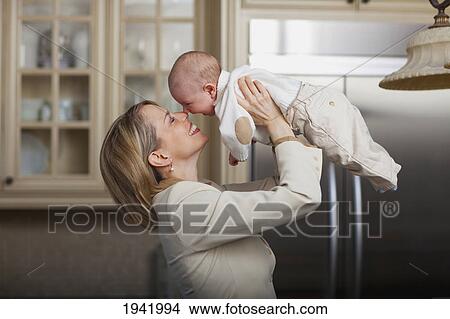Mother Loving Her Baby; Jordan Ontario Canada View Large Photo Image Picture - Mother Loving Her Baby; Jordan Ontario Canada. Fotosearch