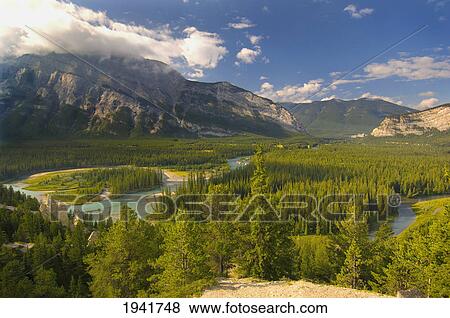 Mountains And Forest In Banff National Park; Banff Alberta Canada View Large Photo Image Stock Photo - Mountains And Forest In Banff National Park; Banff Alberta Canada. Fotosearch