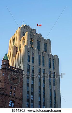Stock Image - new york life insurance building and the aldred building; montreal quebec canada. Fotosearch