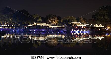 Stock Photograph - Night Reflections In Qian Lake; Beijing, China. Fotosearch