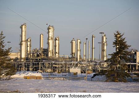 Oil Refinery Towers In Winter At Sunset; Fort Saskatchewan, Alberta, Canada View Large Photo Image Stock Photo - Oil Refinery Towers In Winter At Sunset; Fort Saskatchewan, Alberta, Canada. Fotosearch