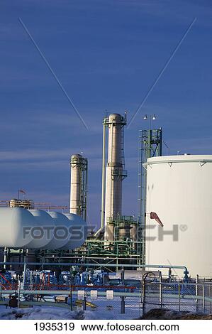 Oil Tanks And Refinery Towers In Winter At Sunset; Fort Saskatchewan, Alberta, Canada View Large Photo Image Stock Photo - Oil Tanks And Refinery Towers In Winter At Sunset; Fort Saskatchewan, Alberta, Canada. Fotosearch