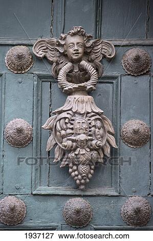 Stock Photo - Ornate Door Knocker On A Green Door Of Templo De La Compania De Jesus; Cusco Peru. Fotosearch