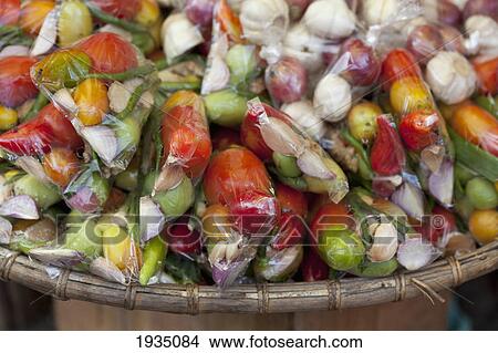 Picture - Packets Of Fresh Vegetables; Bais, s Island, Philippines. Fotosearch