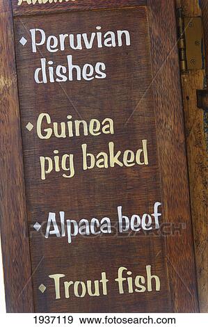 Peruvian Food Items Listed On A Wooden Door; Cusco Peru View Large Photo Image Stock Photo - Peruvian Food Items Listed On A Wooden Door; Cusco Peru. Fotosearch