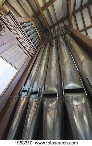 Stock Image - pipes of a pipe organ; northumberland england. Fotosearch
