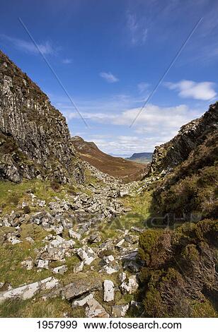 Stock Photo - pitchstone lava columns and moorland; isle of eigg small isles scotland. Fotosearch