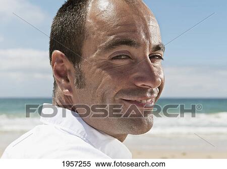 Stock Photography - portrait of a man at the beach; tarifa cadiz andalusia spain. Fotosearch