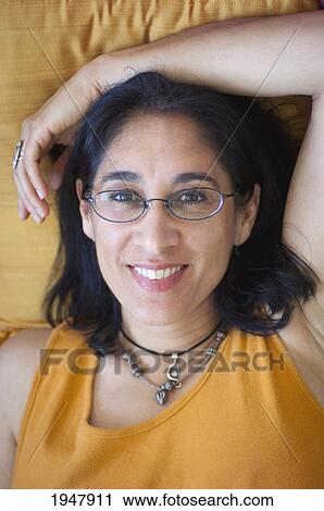 Stock Image - portrait of a woman wearing glasses; oakland california united states of america. Fotosearch