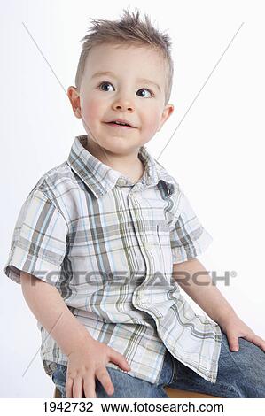 Portrait Of A Young Boy; Edmonton Alberta Canada View Large Photo Image Stock Image - Portrait Of A Young Boy; Edmonton Alberta Canada. Fotosearch