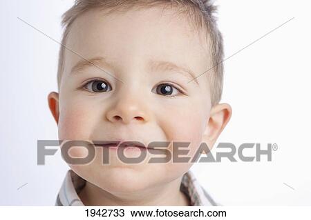 Stock Image - Portrait Of A Young Boy; Edmonton Alberta. Fotosearch