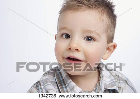 Stock Photograph - Portrait Of A Young Boy; Edmonton Alberta Canada. Fotosearch