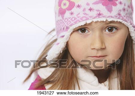 Portrait Of A Young Girl Wearing A Pink Hat; Troutdale Oregon United States Of America View Large Photo Image Stock Photo - Portrait Of A Young Girl Wearing A Pink Hat; Troutdale Oregon United States Of America. Fotosearch