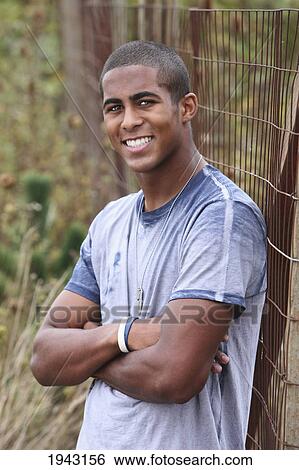 Stock Photograph - Portrait Of A Young Man; Troutdale Oregon United States Of America. Fotosearch