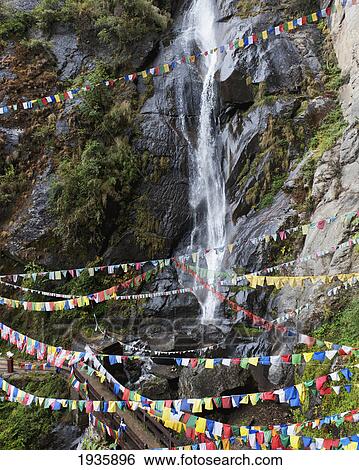 Stock Photograph - Prayer Flags In The Buddhist Tiger's Nest Monastery; Paro Valley, Taktsang, Bhutan. Fotosearch