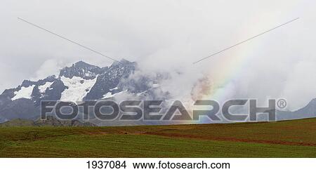 Rainbow Over Valley Landscape; Sacred Valley Peru View Large Photo Image Picture - Rainbow Over Valley Landscape; Sacred Valley Peru. Fotosearch