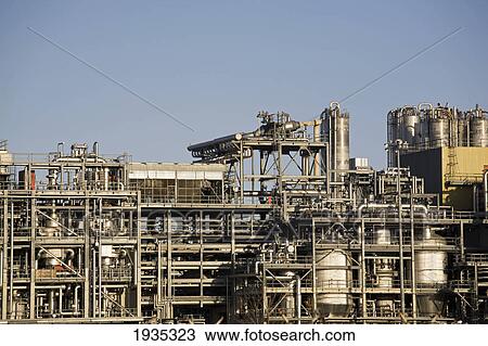 Refinery Pipes Against A Blue Sky; Fort Saskatchewan, Alberta, Canada View Large Photo Image Stock Image - Refinery Pipes Against A Blue Sky; Fort Saskatchewan, Alberta, Canada. Fotosearch