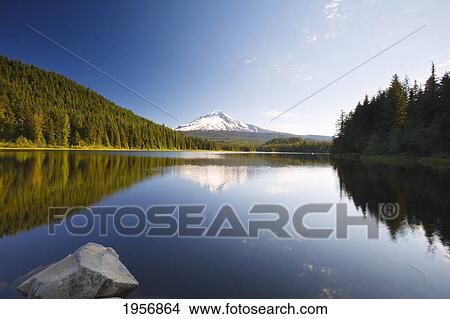 reflection of mount hood in trillium lake in the oregon cascades; oregon united states of america View Large Photo Image Picture - reflection of mount hood in trillium lake in the oregon cascades; oregon united states of america. Fotosearch
