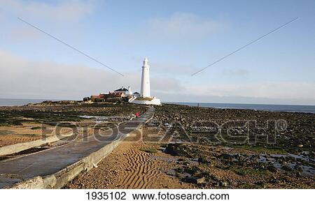 Stock Image - Road To St. Mary's Lighthouse; Whitley Bay, Tyne And Wear, England. Fotosearch