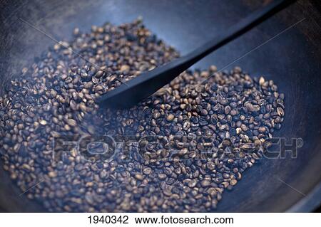 Stock Image - Roasting Coffee Beans; Muara Pinang Sumatera Selatan Indonesia. Fotosearch