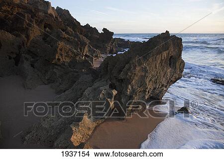 Picture - Rocky Beach; Chiclana De La Frontera Spain. Fotosearch